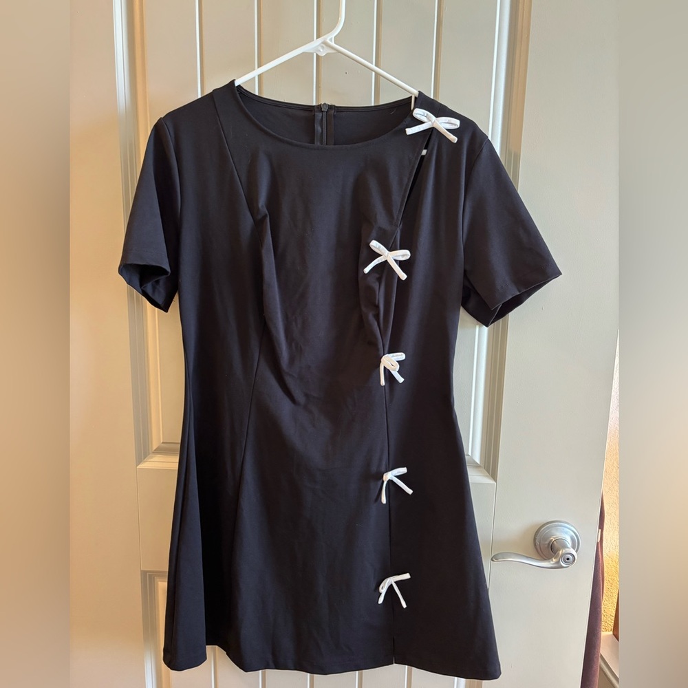 Black Mini Dress with White Bow Accents